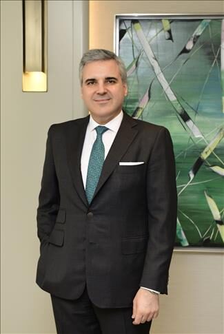 Ege Yapı’nın JCR Eurasia kredi notu A+ seviyesinde korundu Ege Yapı şirket merkez binası ve finansal başarıyı simgeleyen grafikler